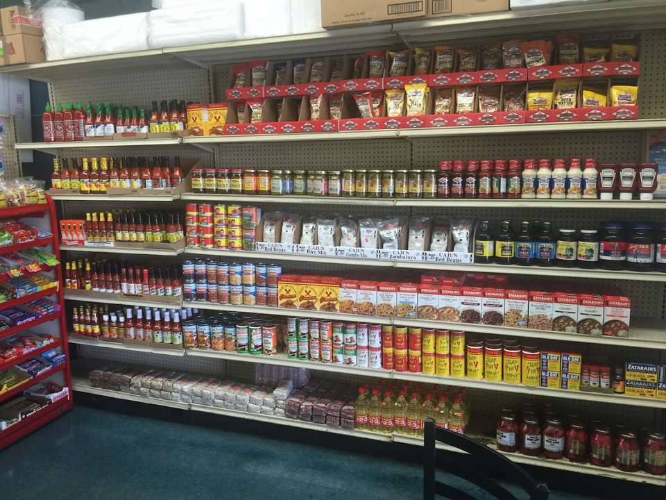 Seafood market shelves with fried food baskets.